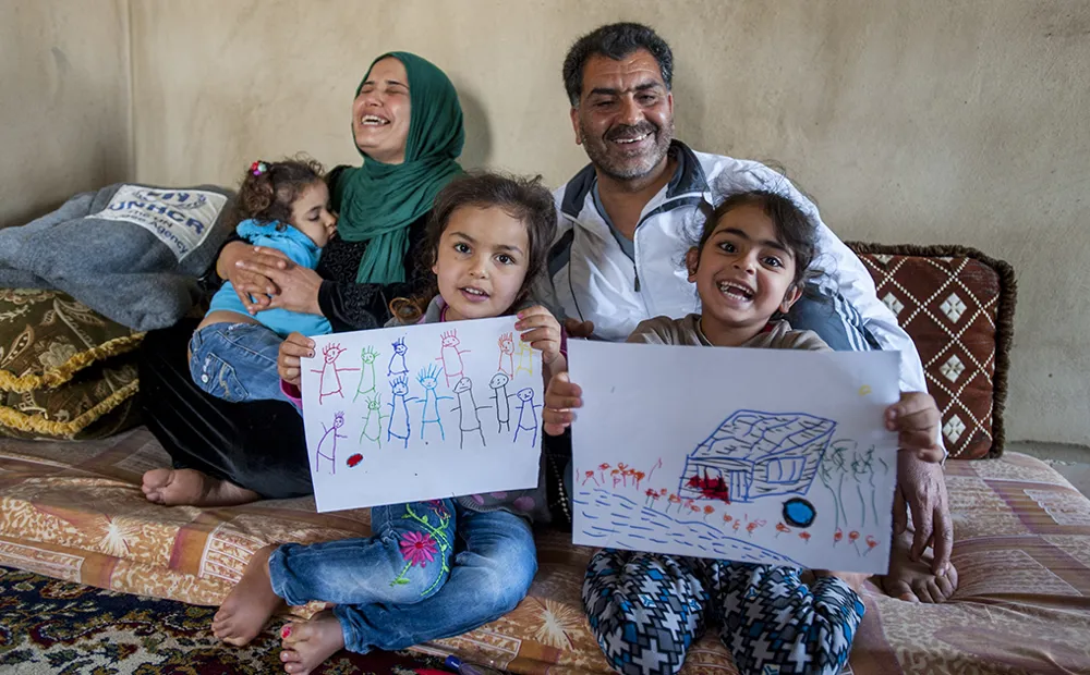 A shelter and electricity for three families