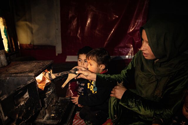 Lebanon_Refugees Are Forced To Use Plastic Shoes To Light Their Stove To Keep Warm