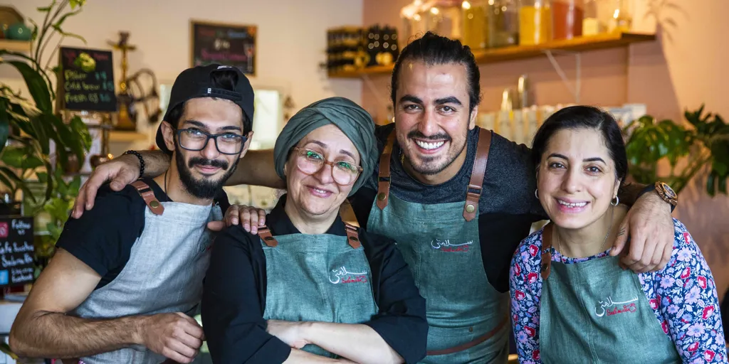 Australia. Hamed Allahyari and work colleagues at SalamaTea cafe