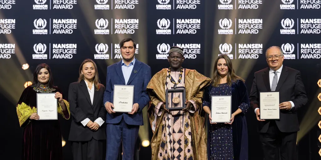 The 2025 winners of the UNHCR Nansen Refugee Awards attend the ceremony in Switzerland.