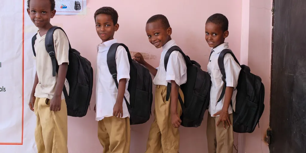 Website Yemen. A Group Of Somali Refugee School Kits Stand With Their New Back To School Kits