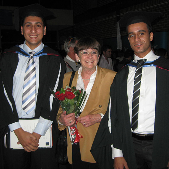 Dorothy Hoddinott With Two Refugee Students