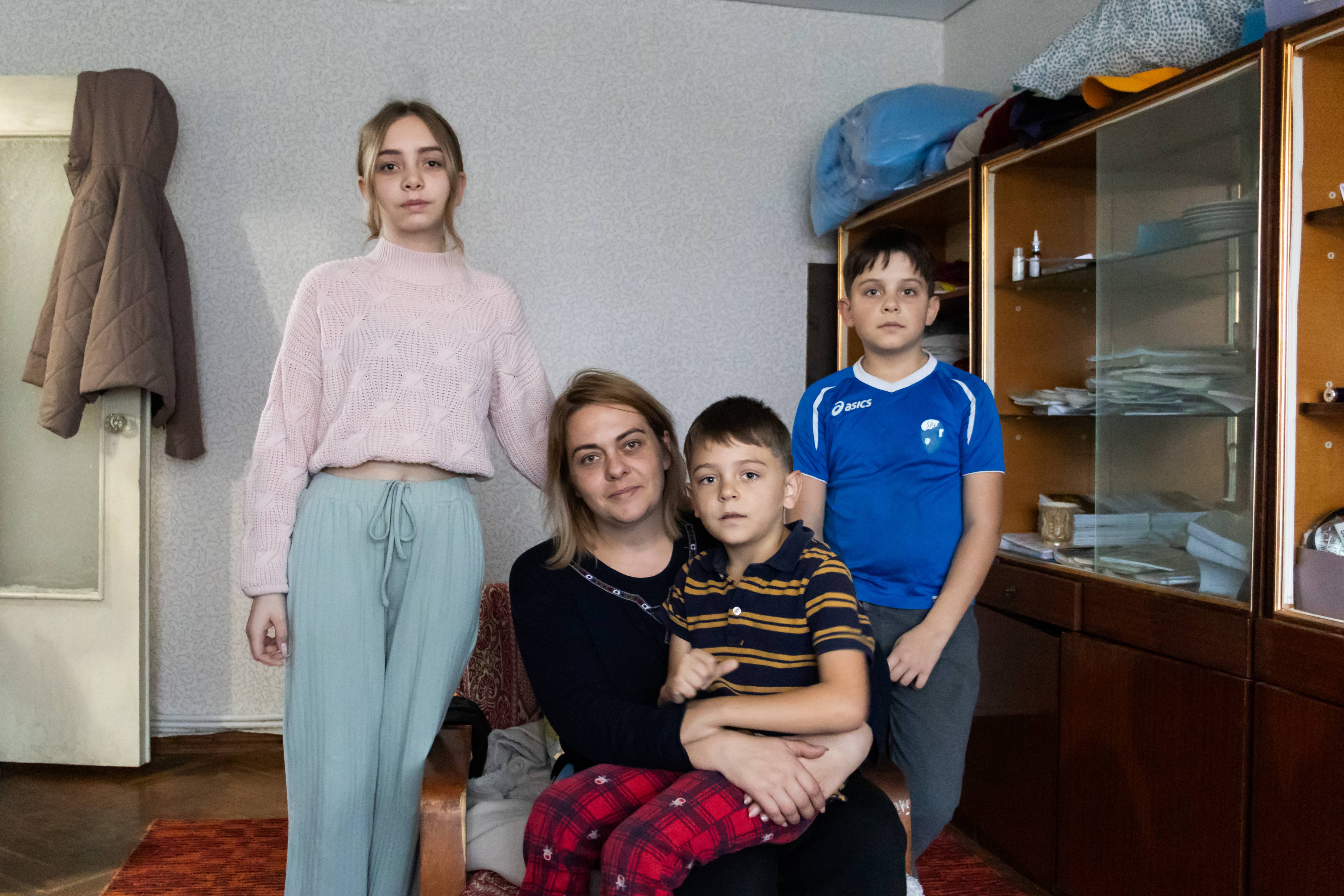Moldova_Olga-picks-up-winter-relief-items-with-her-children