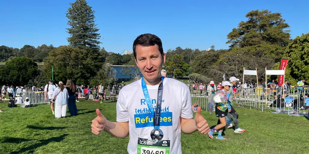 Asif Sultani runs the Sydney Marathon to support refugees